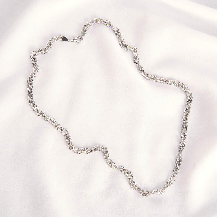 Dây chuyền trắng ovan xoắn móc máy Bảo Tín K&K Vàng kiểu Ý 750