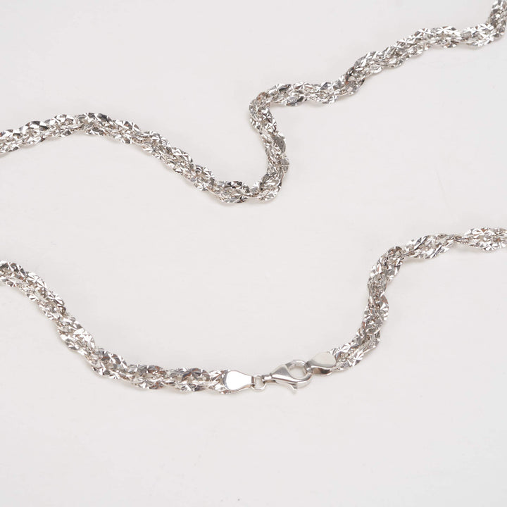 Dây chuyền trắng ovan xoắn móc máy Bảo Tín K&K Vàng kiểu Ý 750