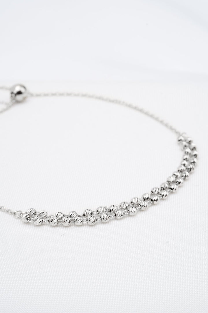 Lắc tay trắng bi đôi Bảo Tín K&K Vàng kiểu Ý 750